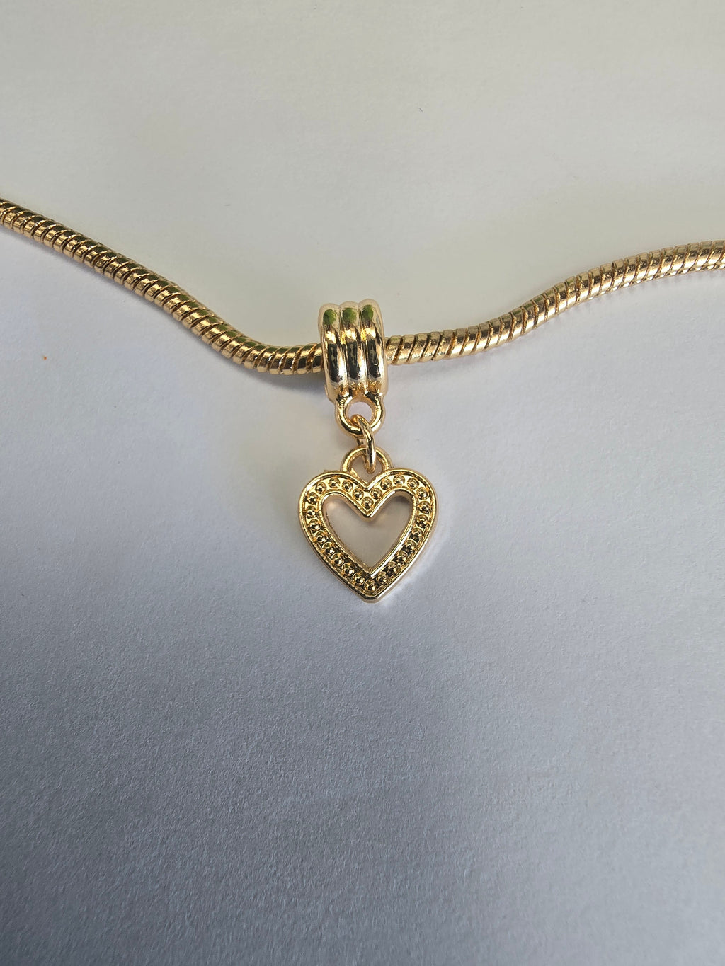 Gold charm fits all charm bracelets