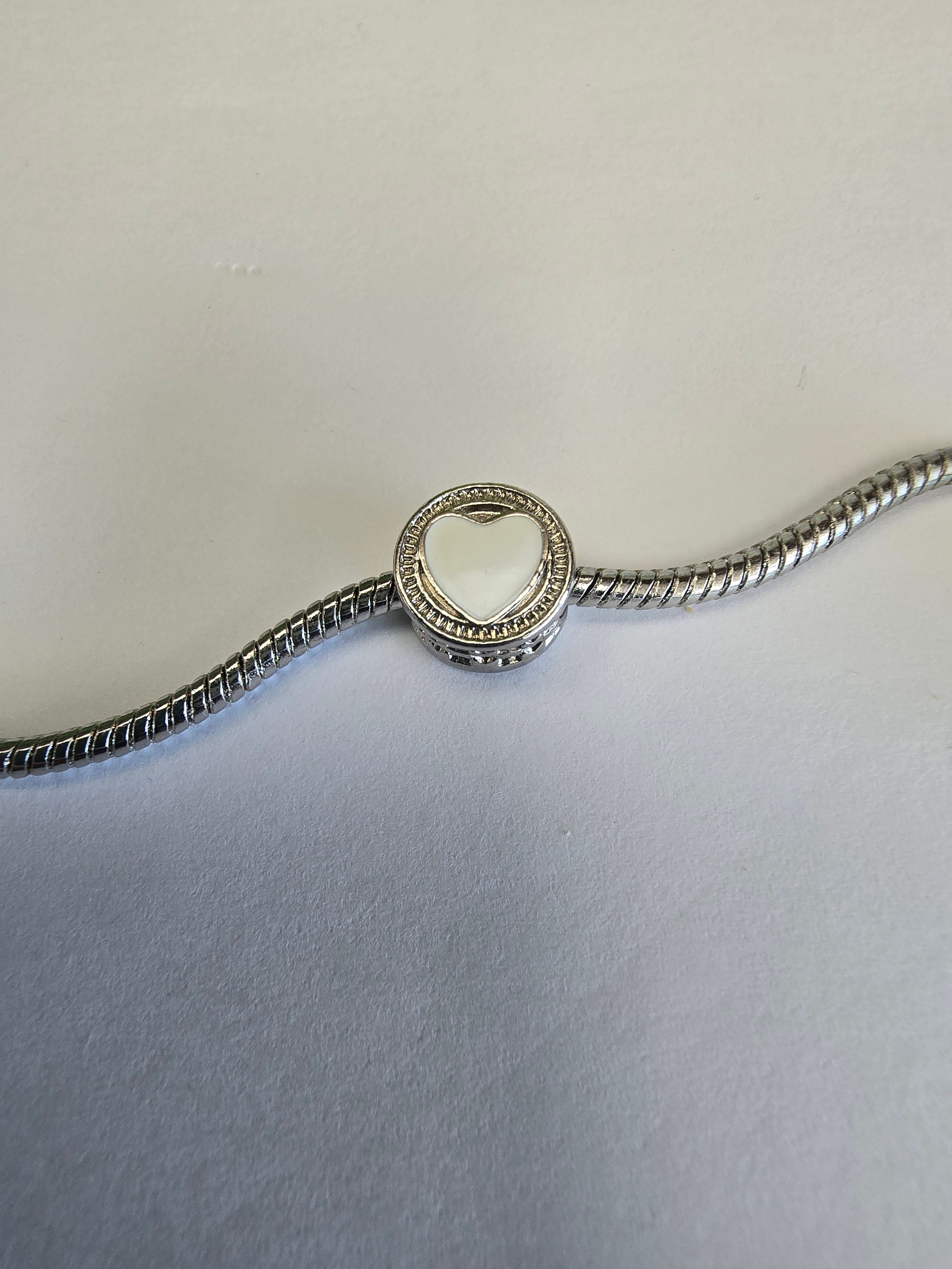 Silver charm fits all charm bracelets