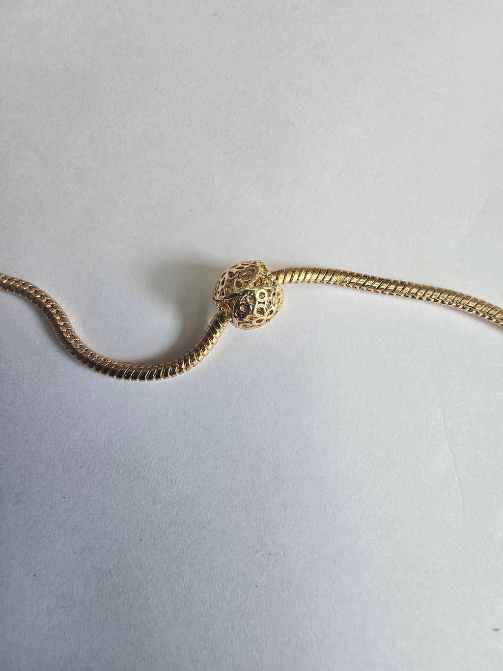 Gold charm fits all charm bracelets