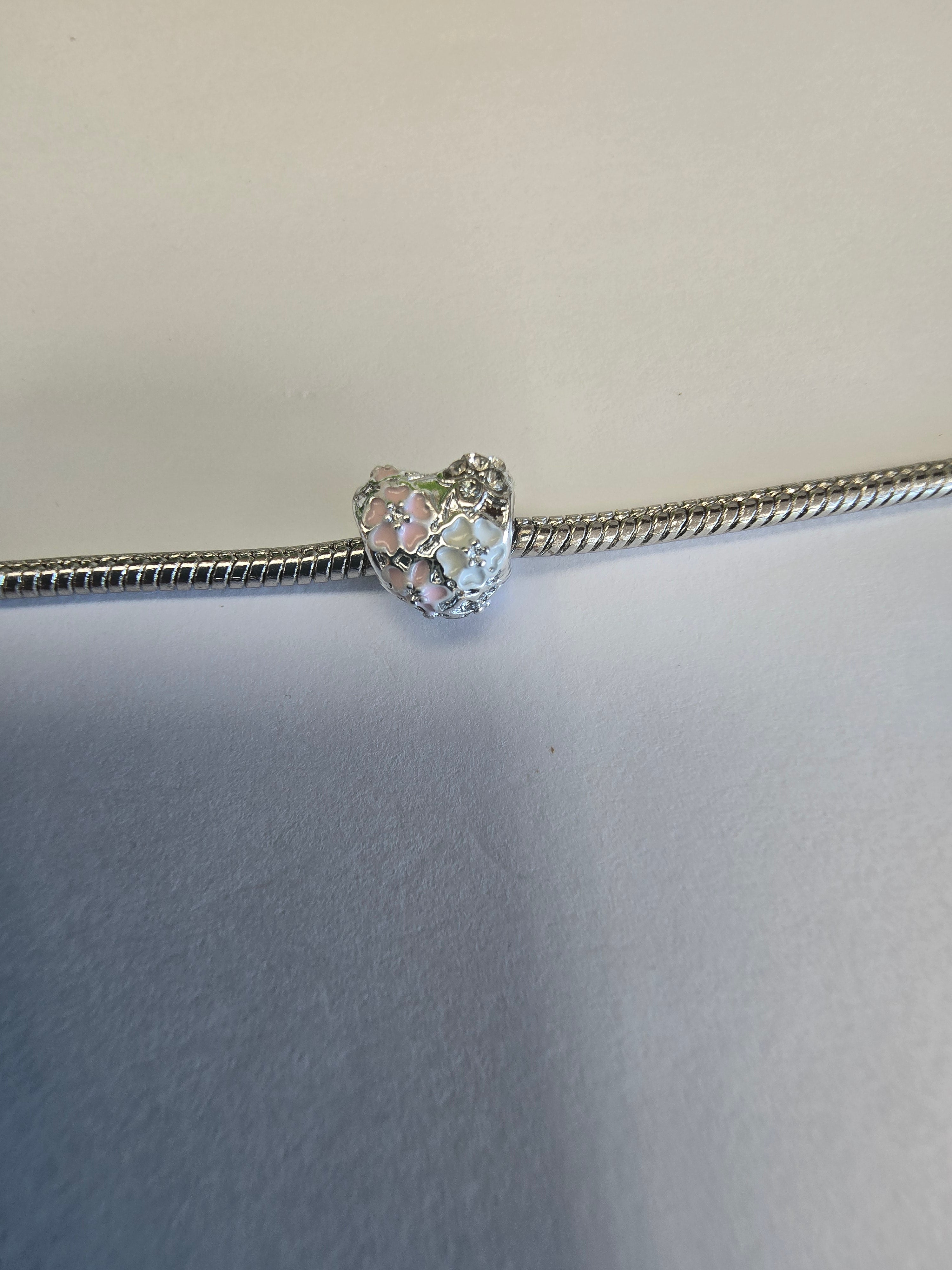 Silver charm fits all charm bracelets