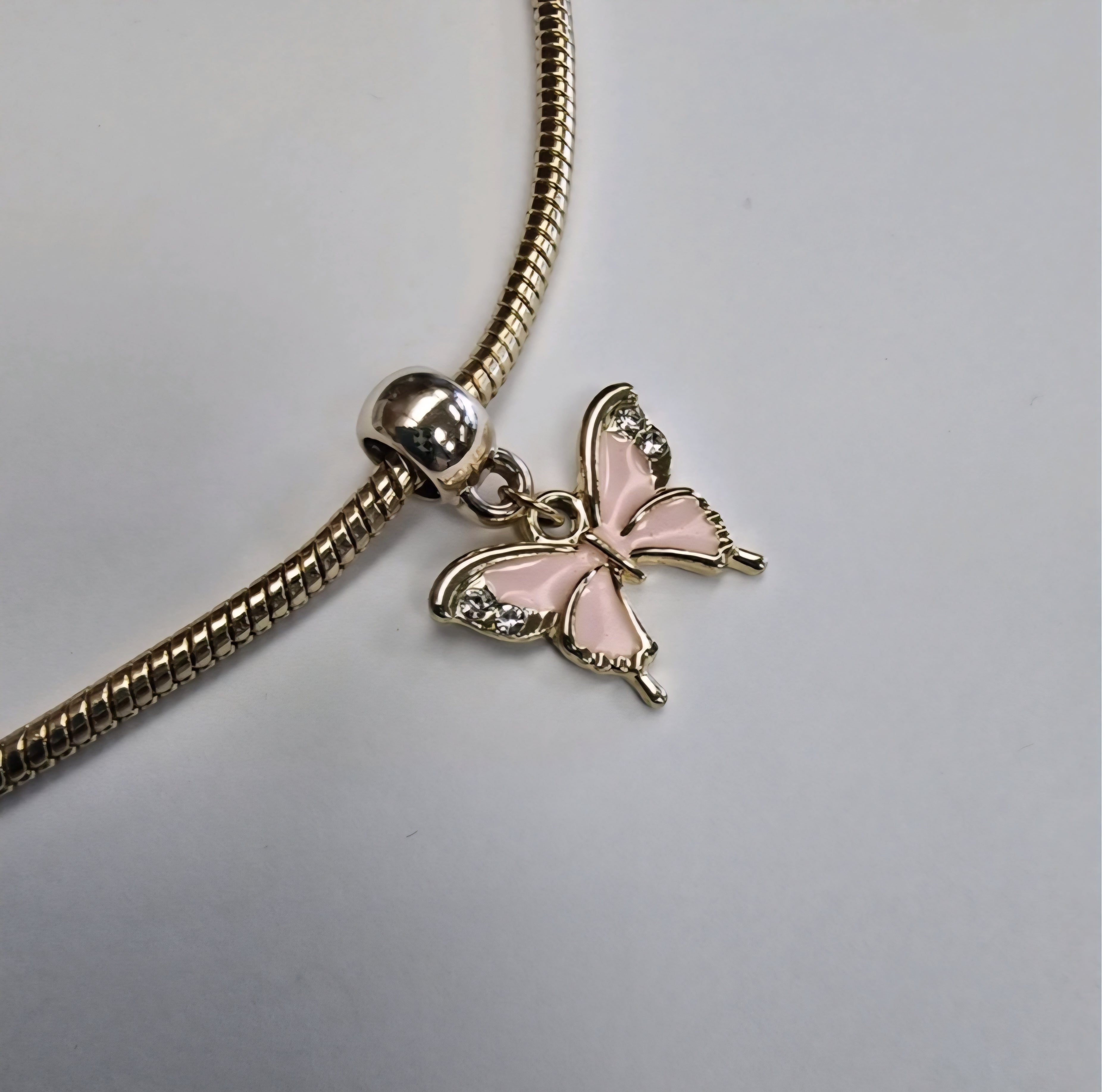Gold charm fits all charm bracelets