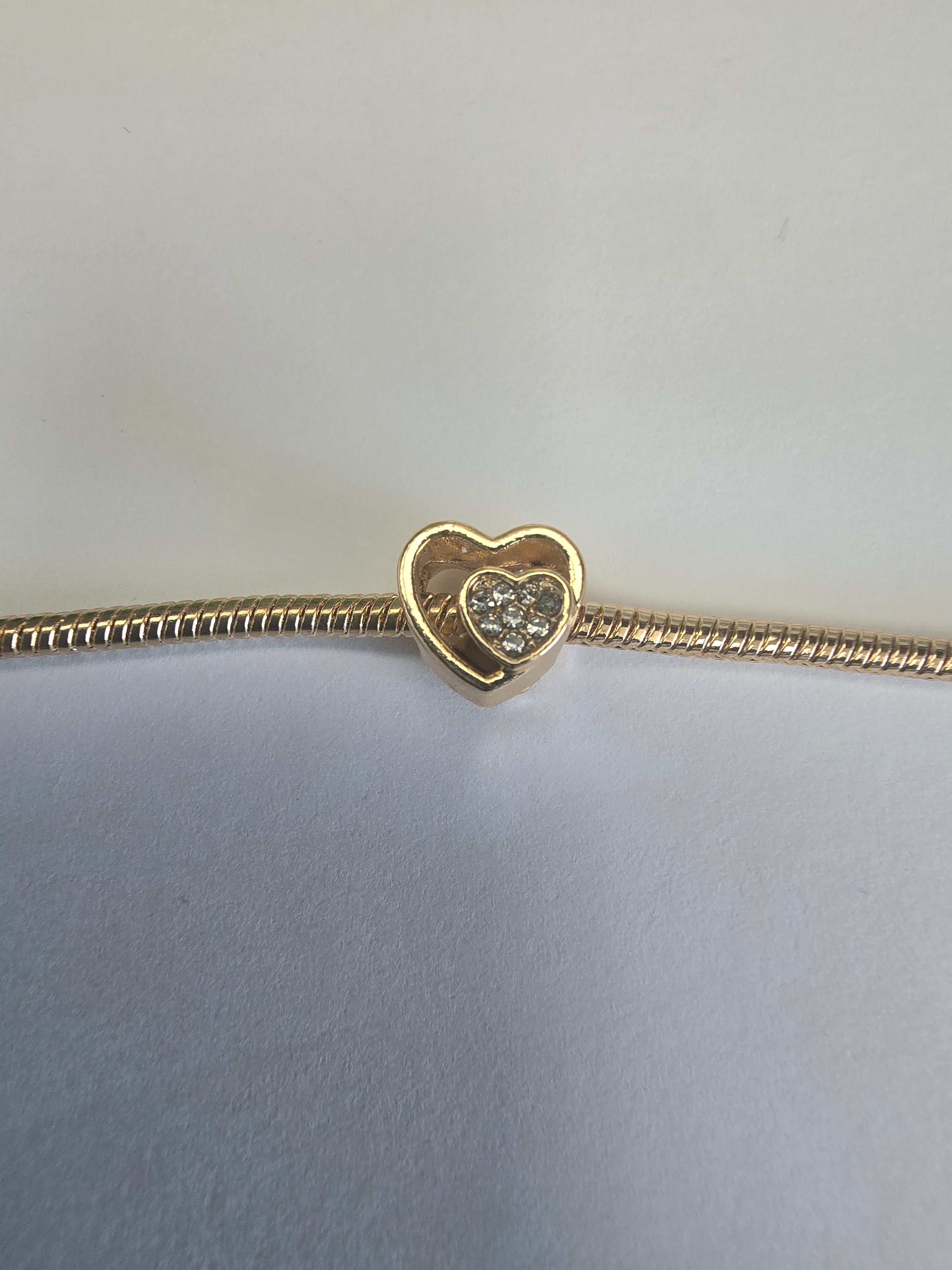 Gold charm fits all charm bracelets