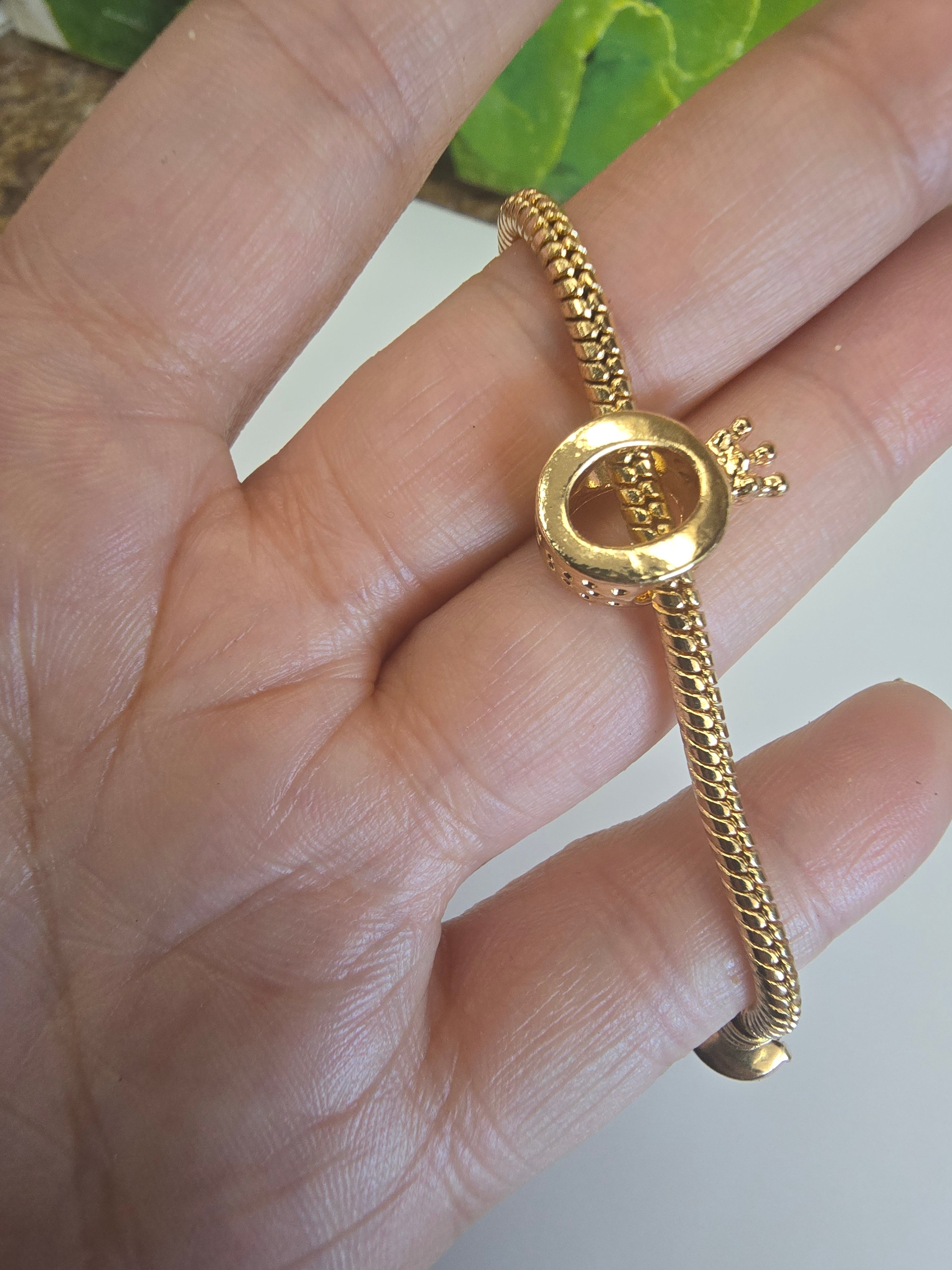 Gold charm fits all charm bracelets