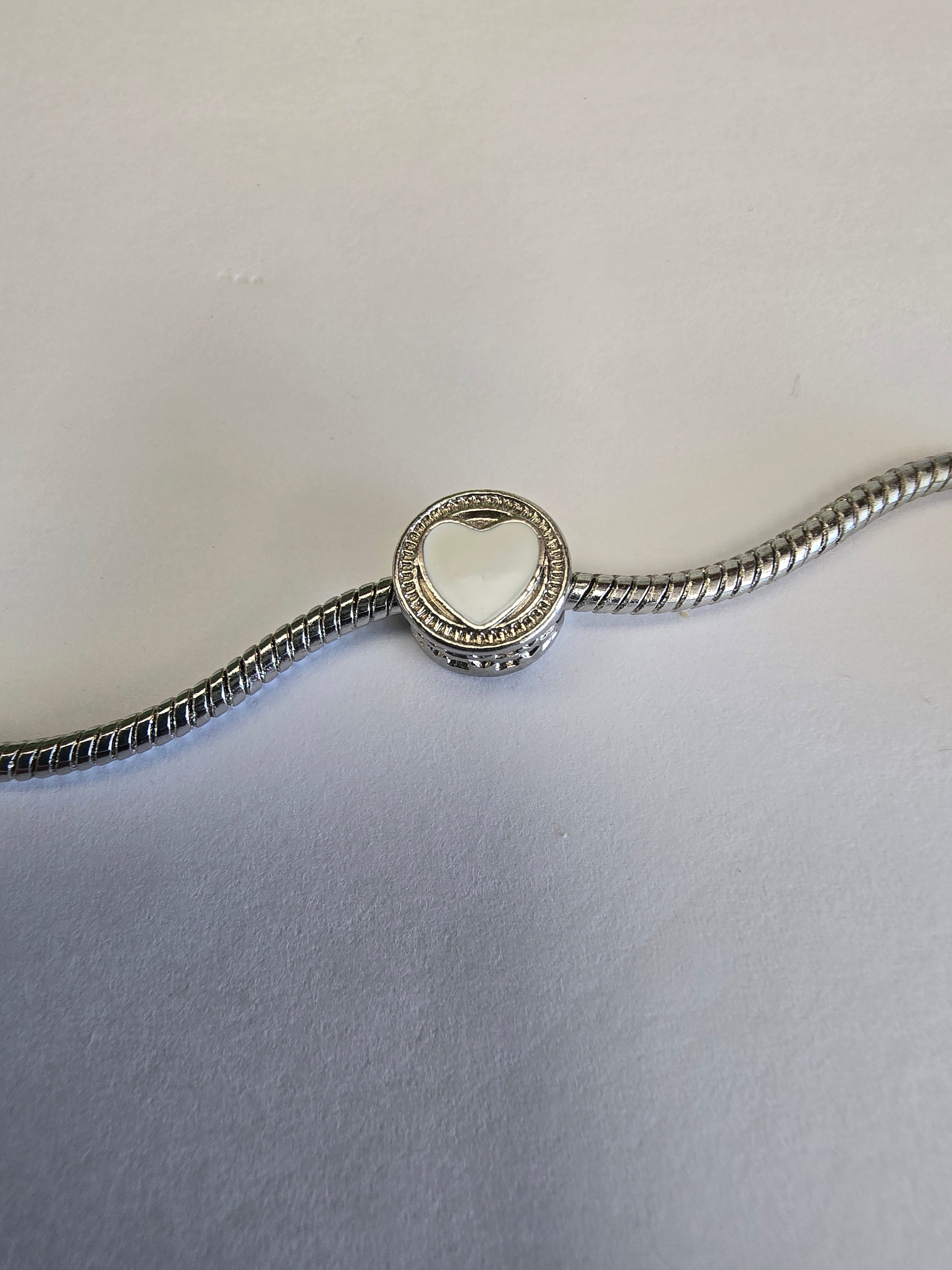 Silver charm fits all charm bracelets