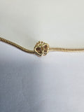 Gold charm fits all charm bracelets