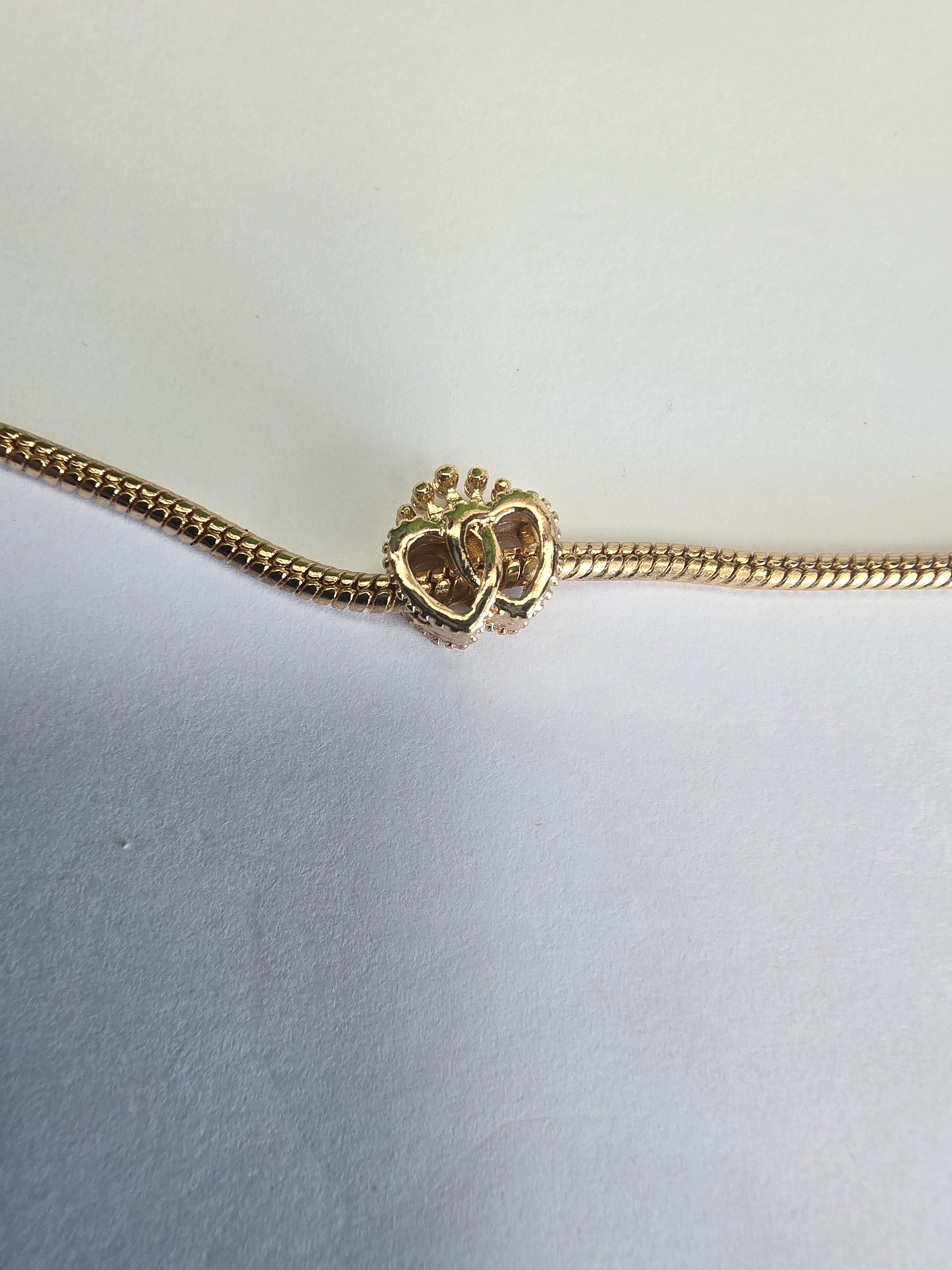 Gold charm fits all charm bracelets