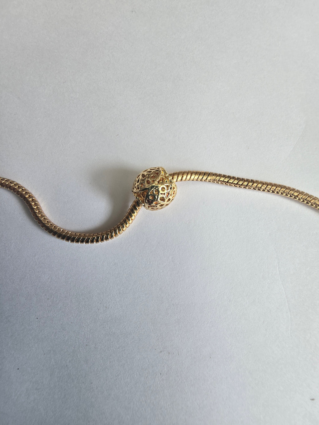 Gold charm fits all charm bracelets