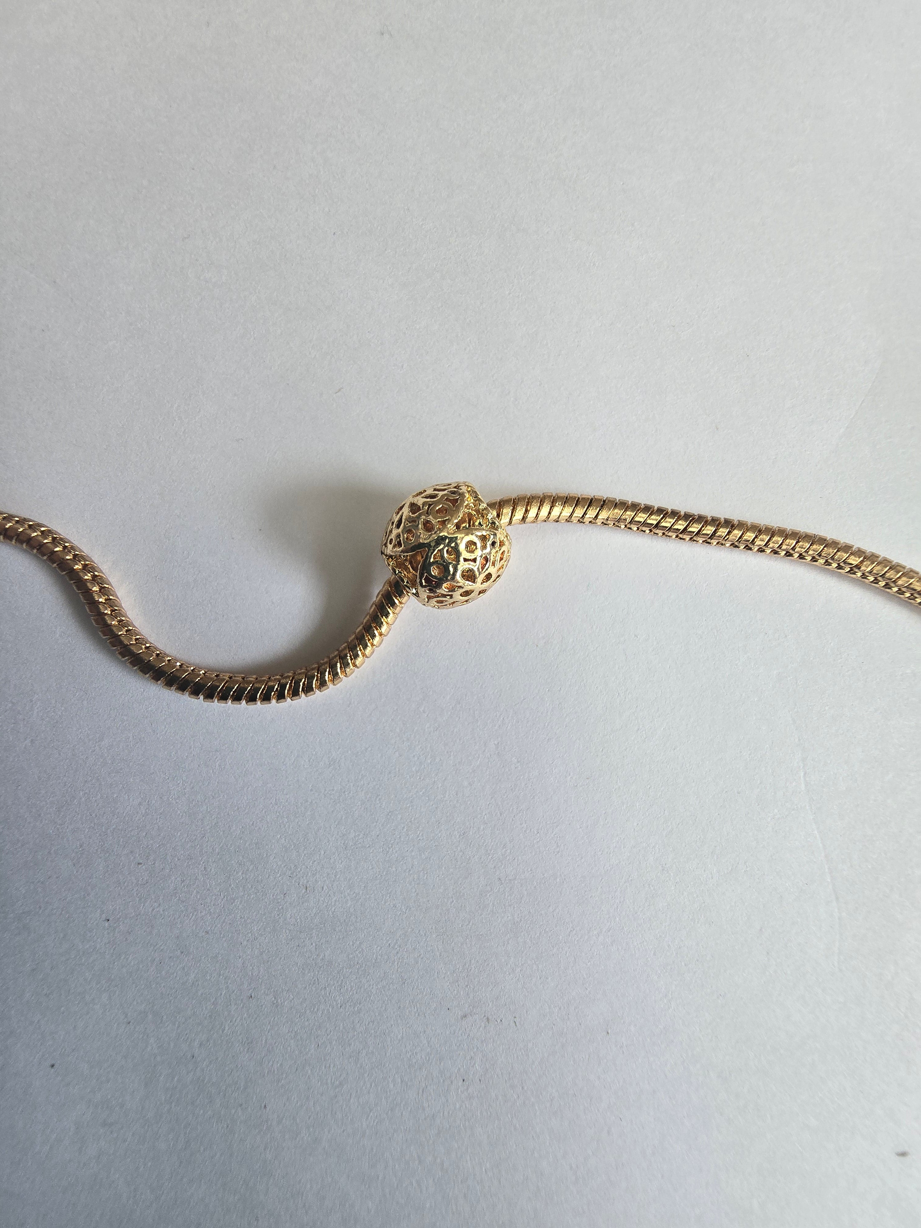 Gold charm fits all charm bracelets