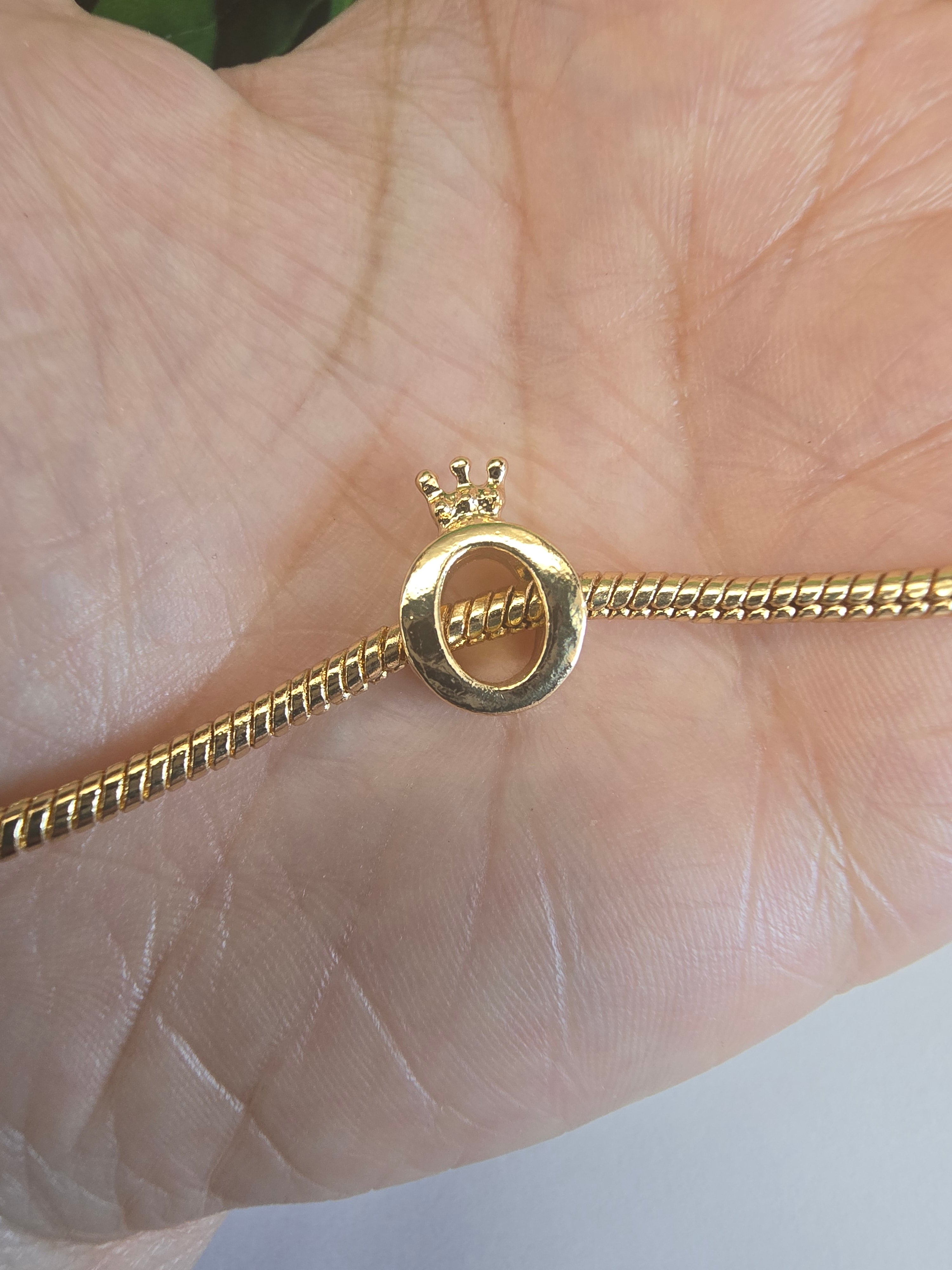 Gold charm fits all charm bracelets