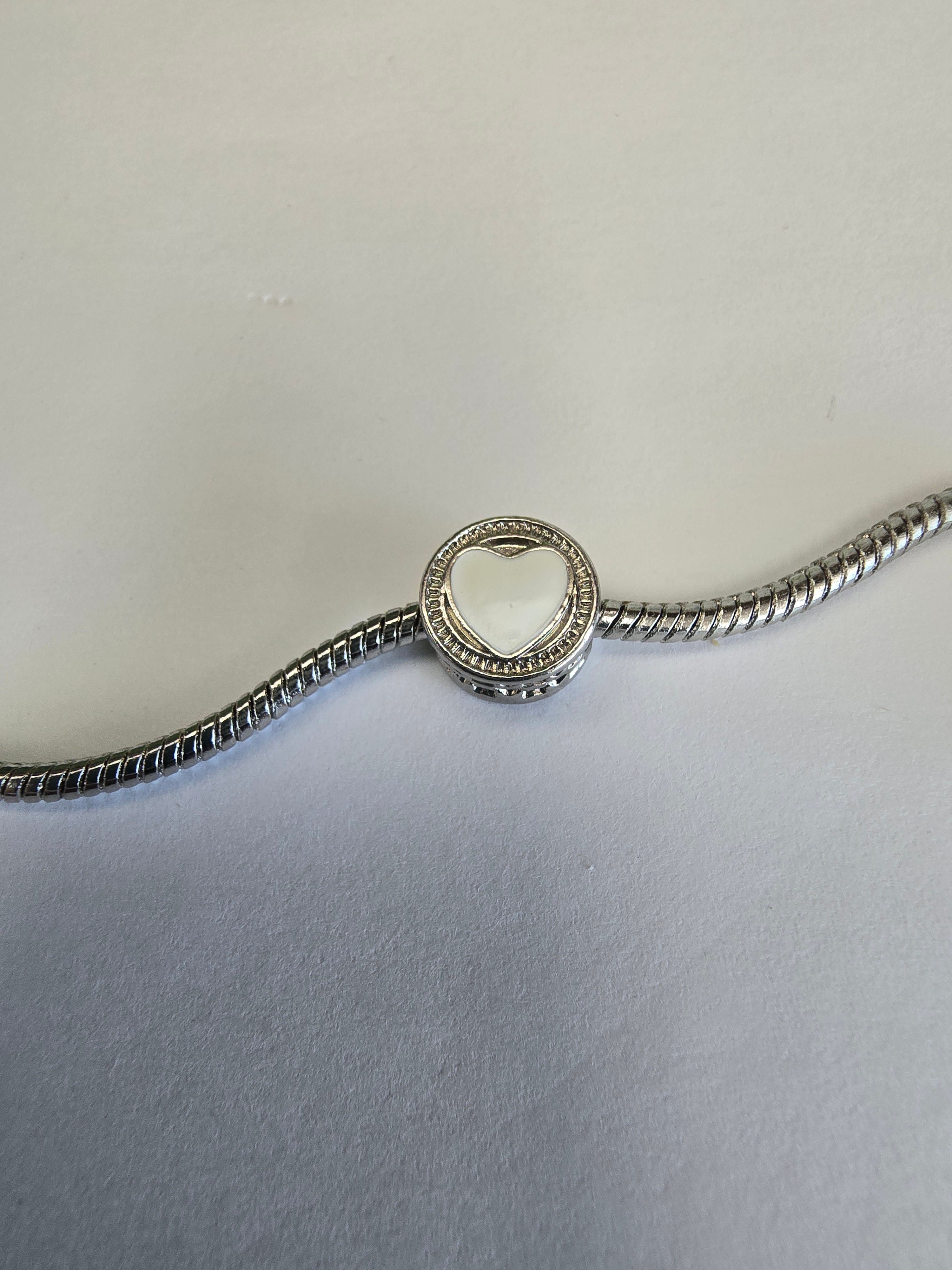 Silver charm fits all charm bracelets