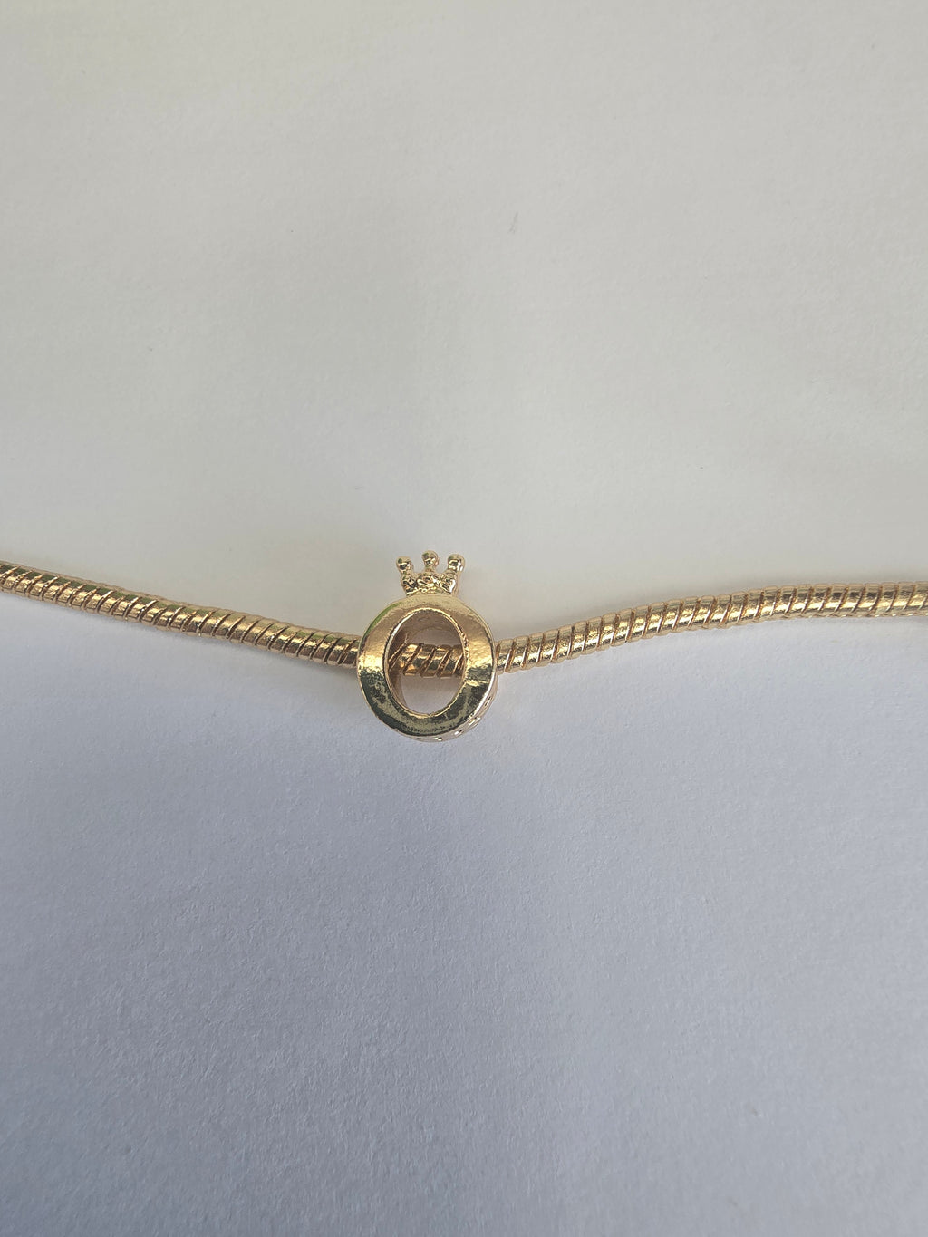 Gold charm fits all charm bracelets