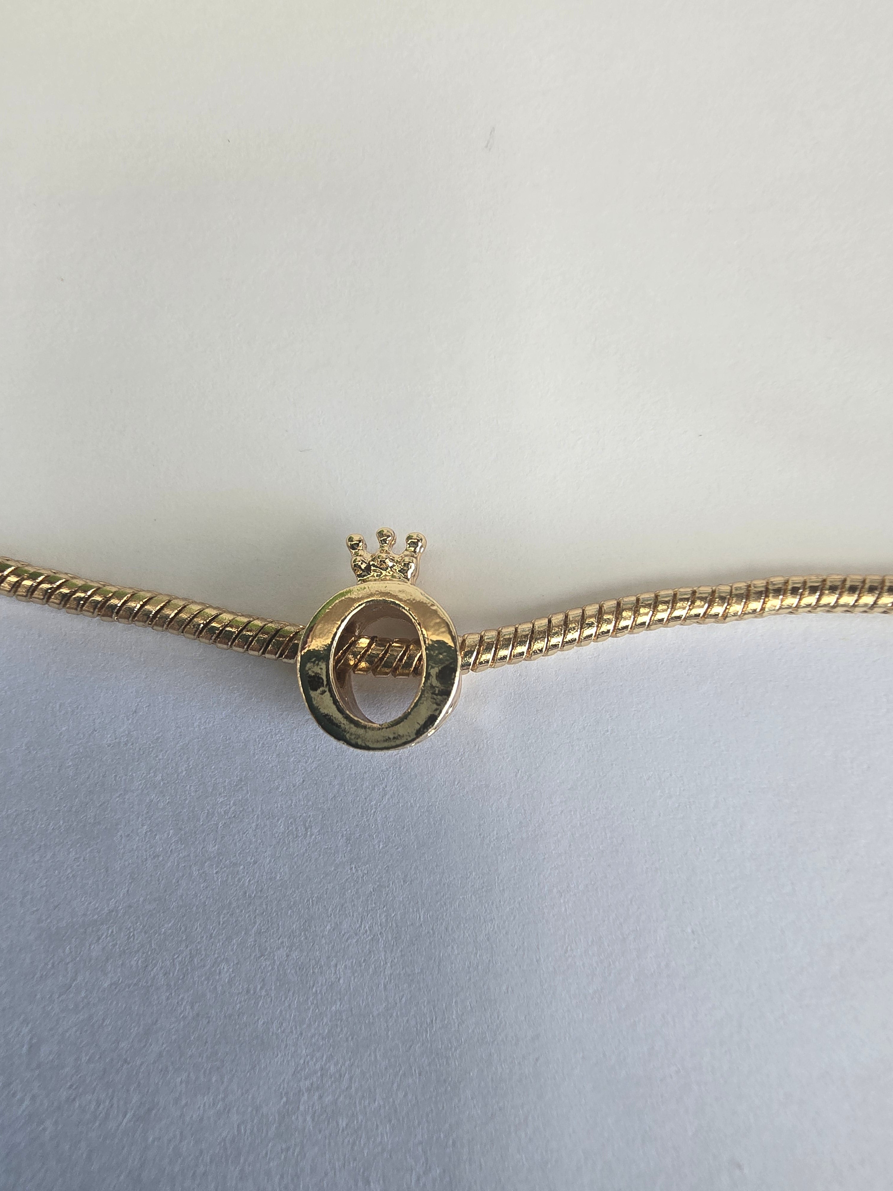 Gold charm fits all charm bracelets