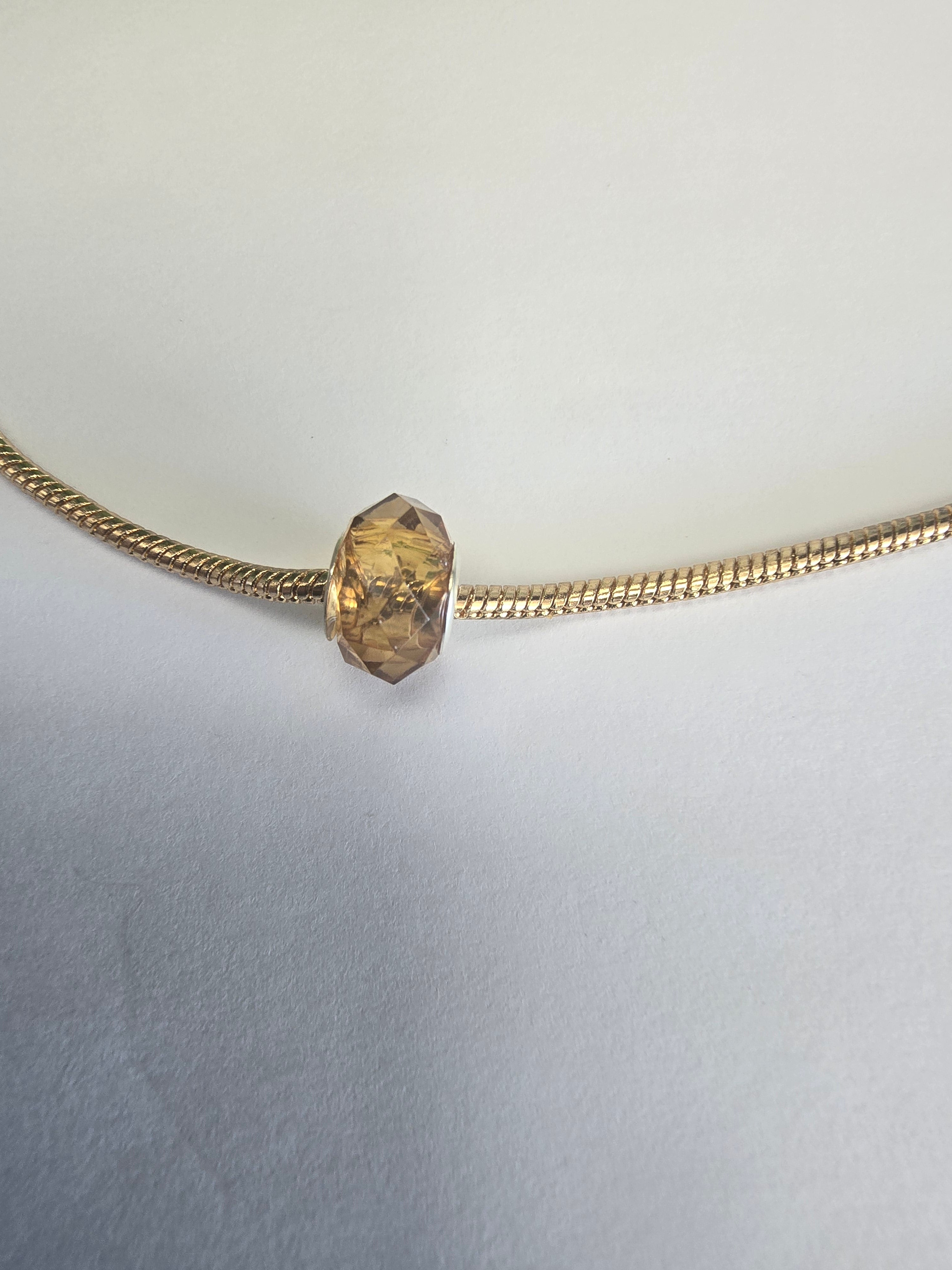 Gold charm fits all charm bracelets