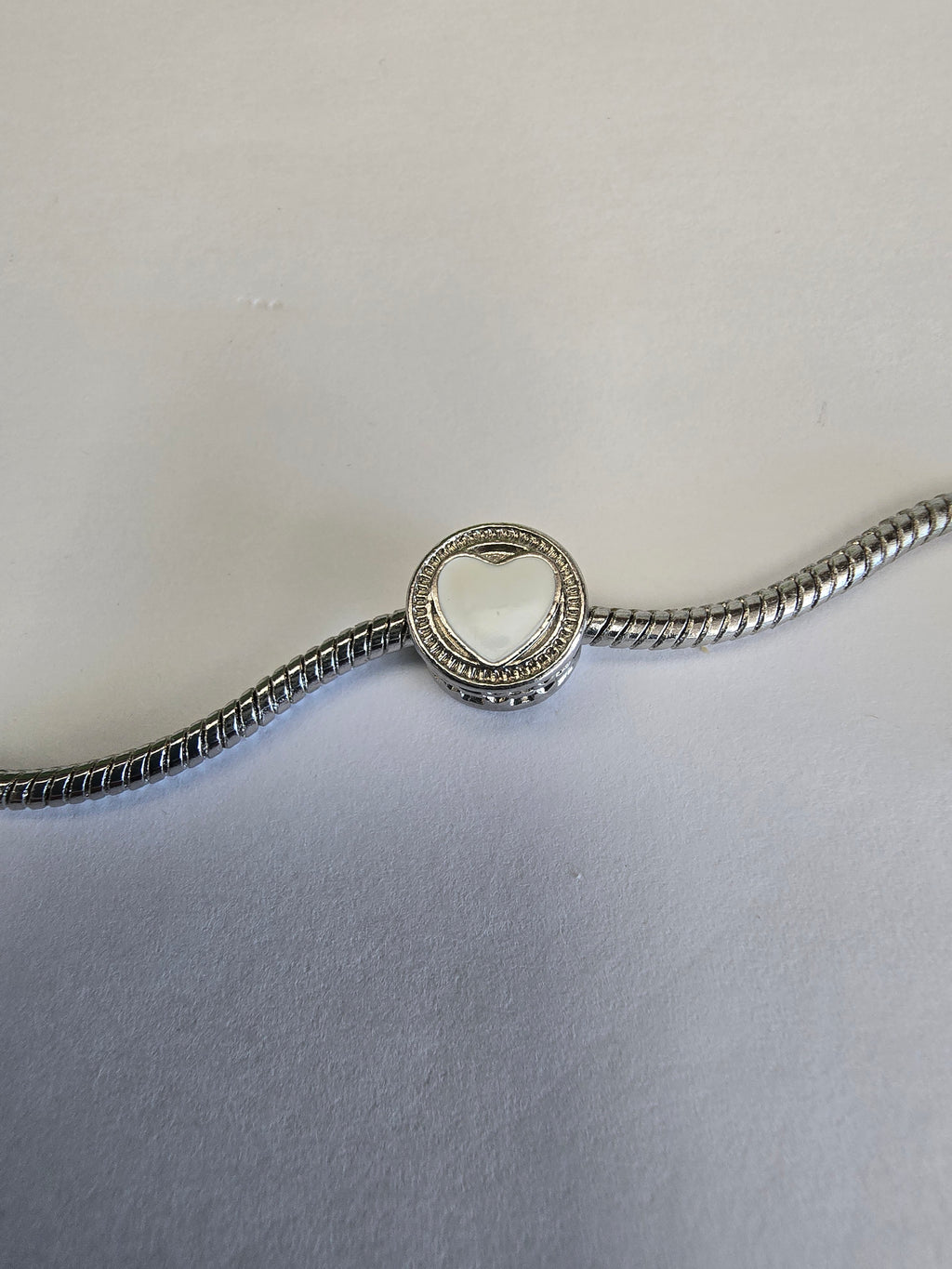 Silver charm fits all charm bracelets