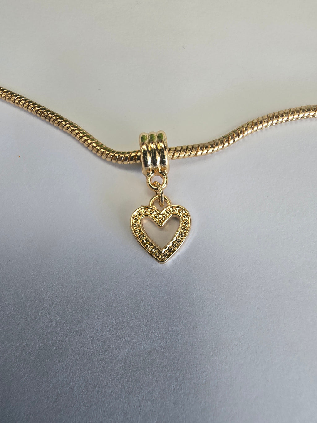 Gold charm fits all charm bracelets