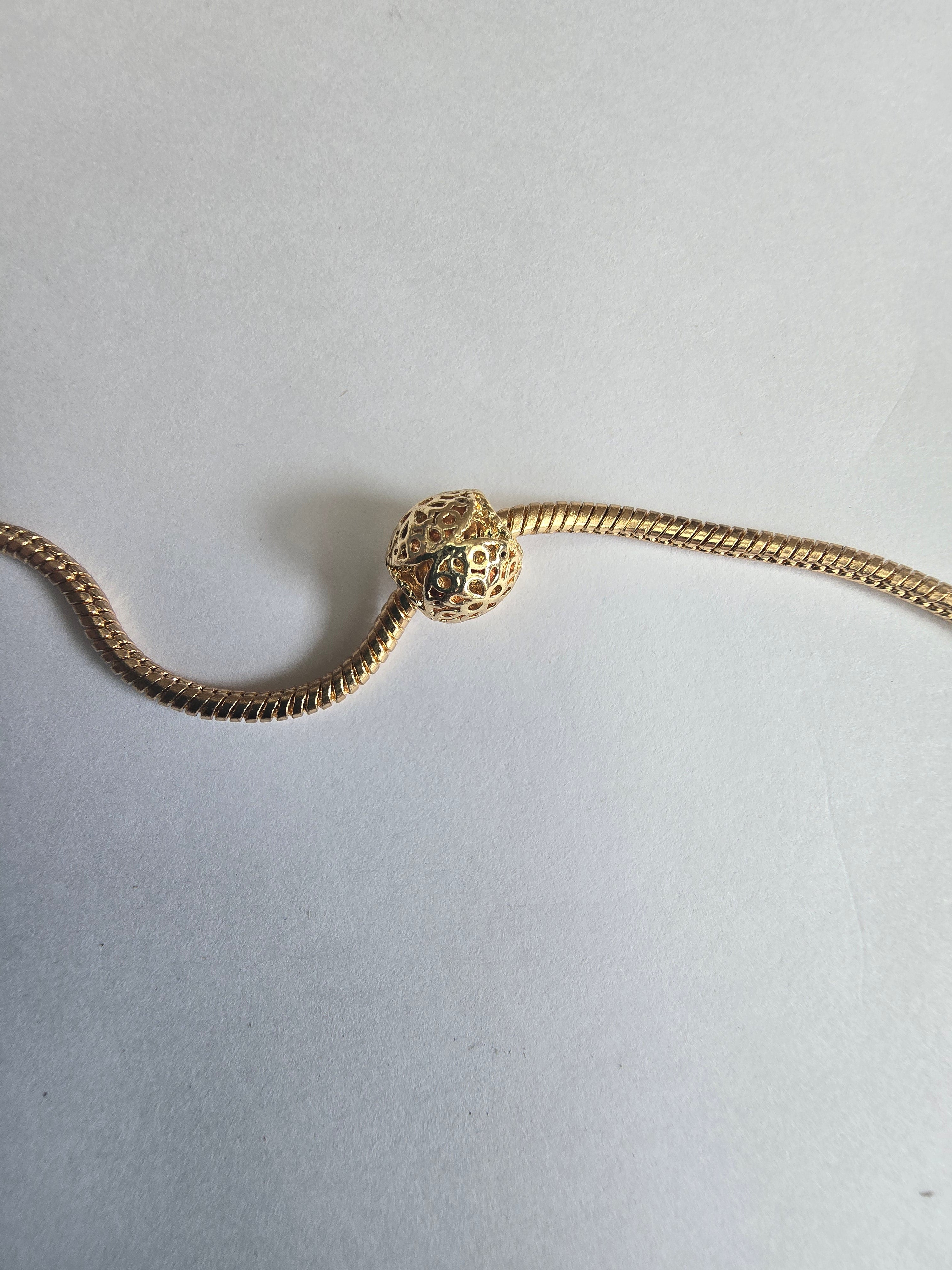 Gold charm fits all charm bracelets
