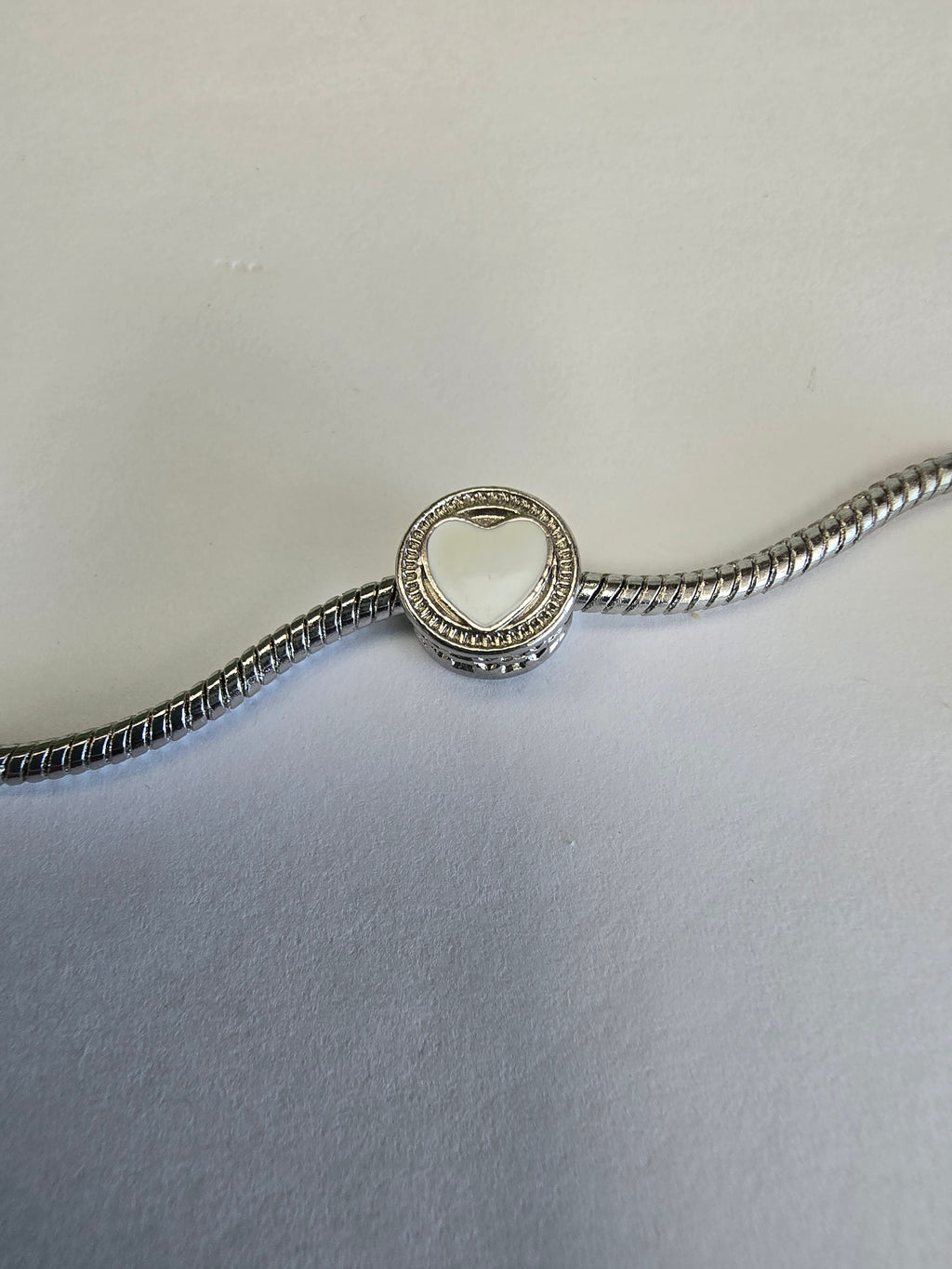 Silver charm fits all charm bracelets