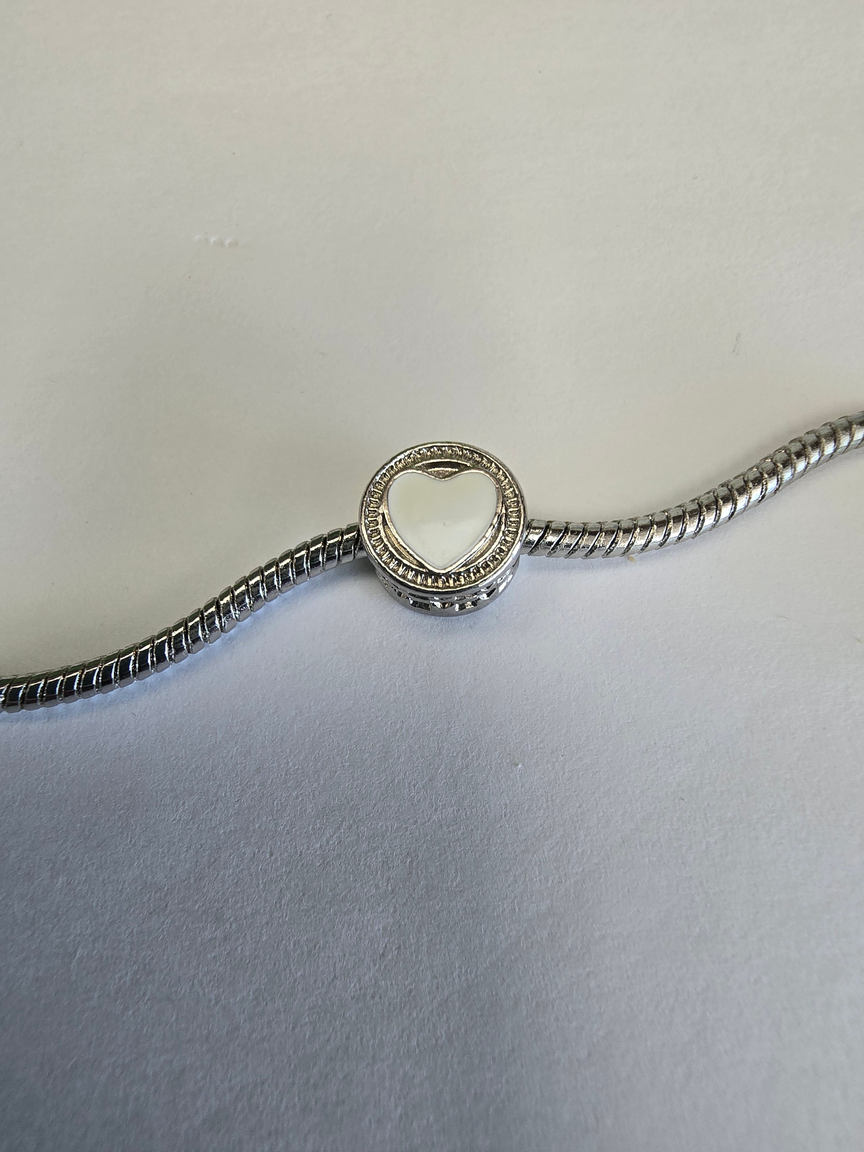 Silver charm fits all charm bracelets