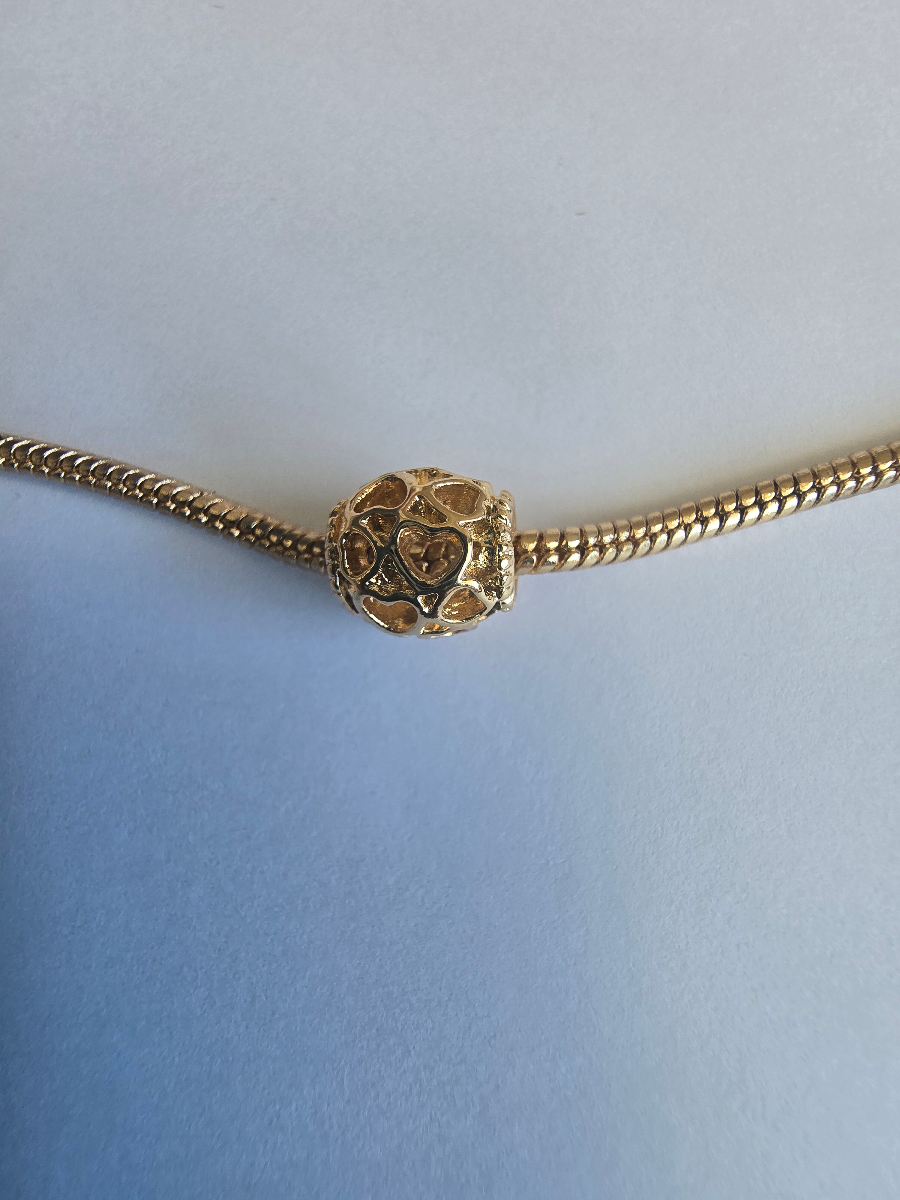 Gold charm fits all charm bracelets