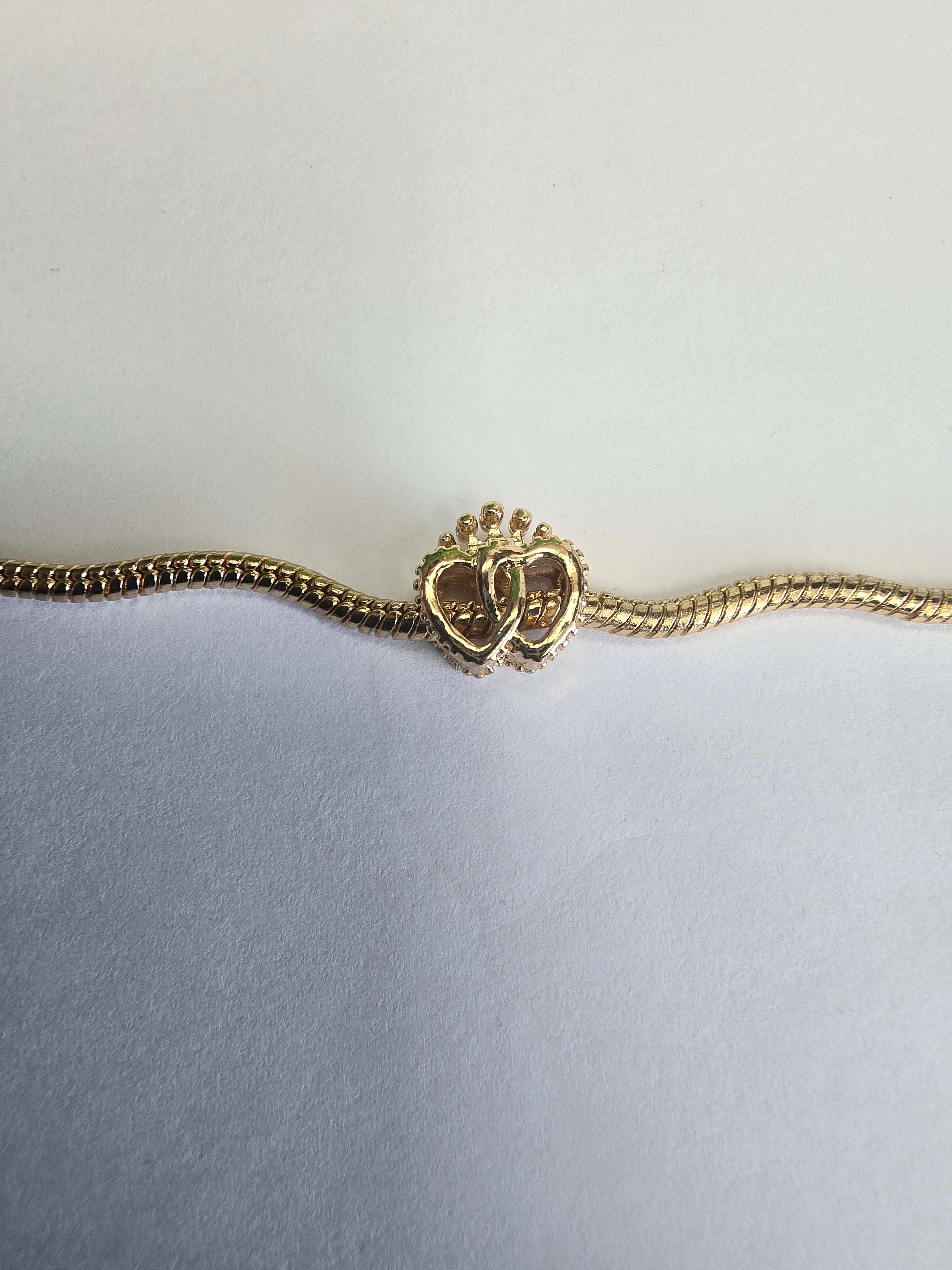 Gold charm fits all charm bracelets