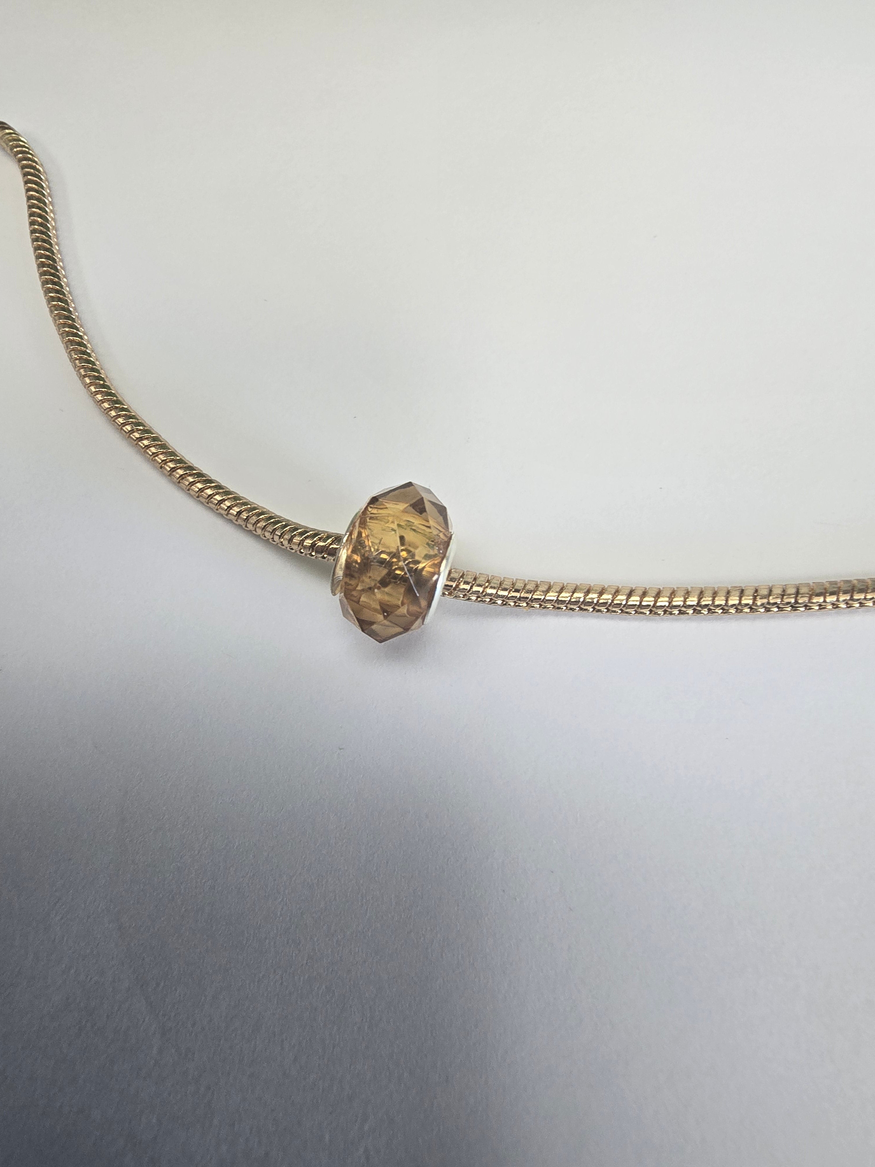 Gold charm fits all charm bracelets