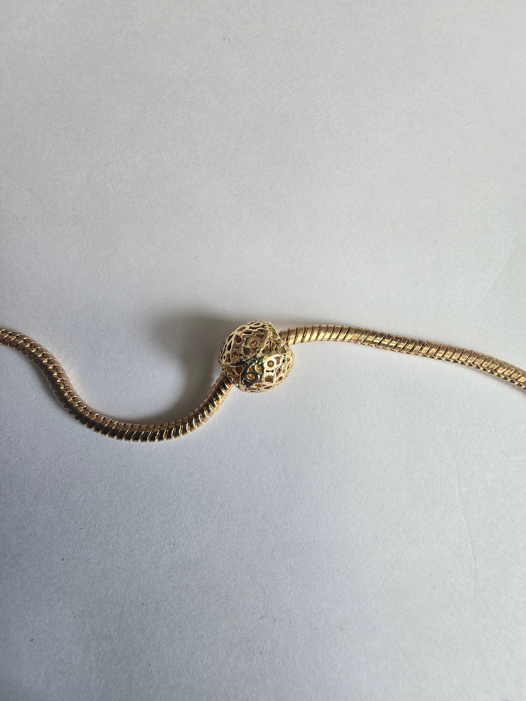 Gold charm fits all charm bracelets