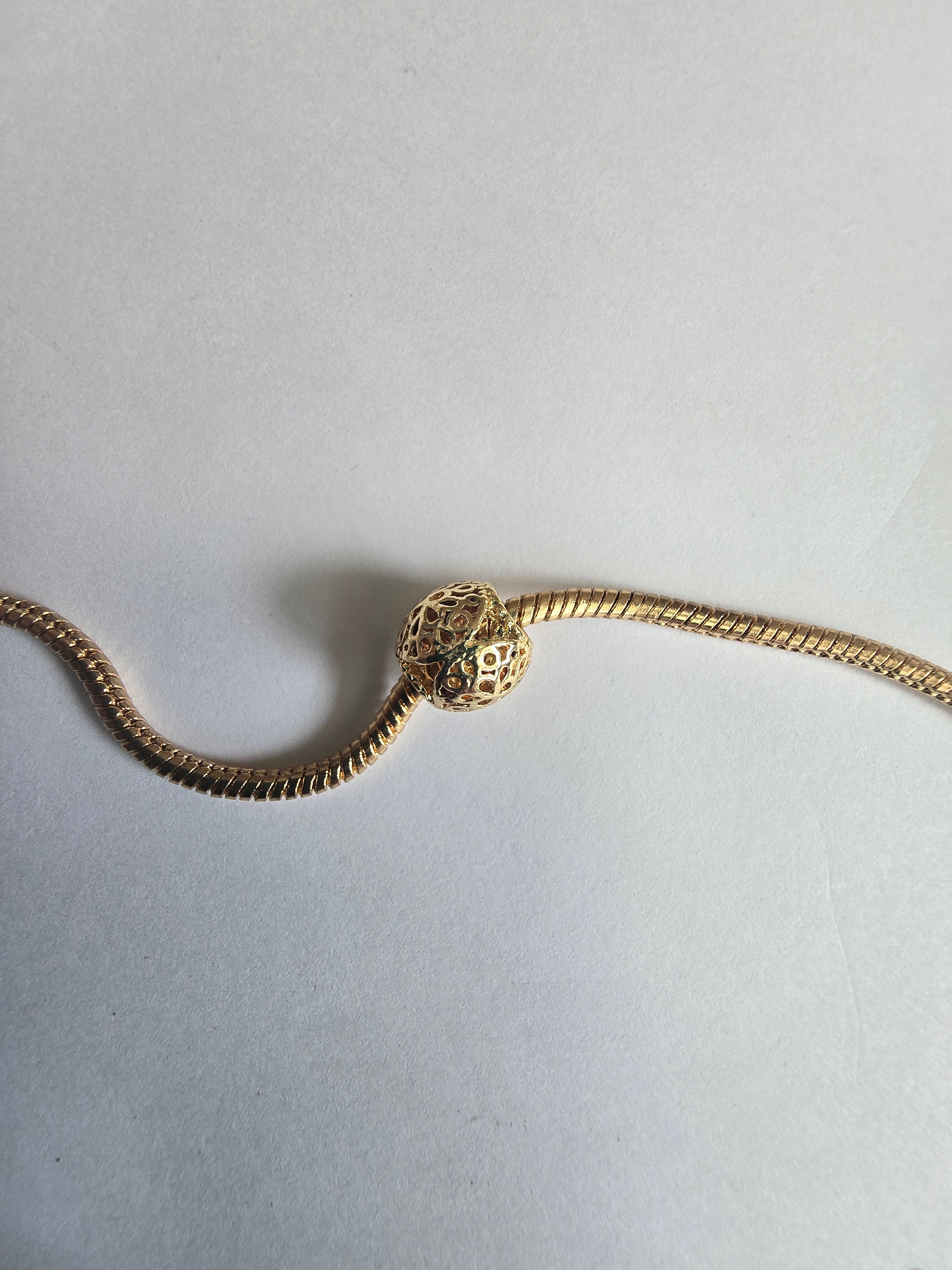 Gold charm fits all charm bracelets