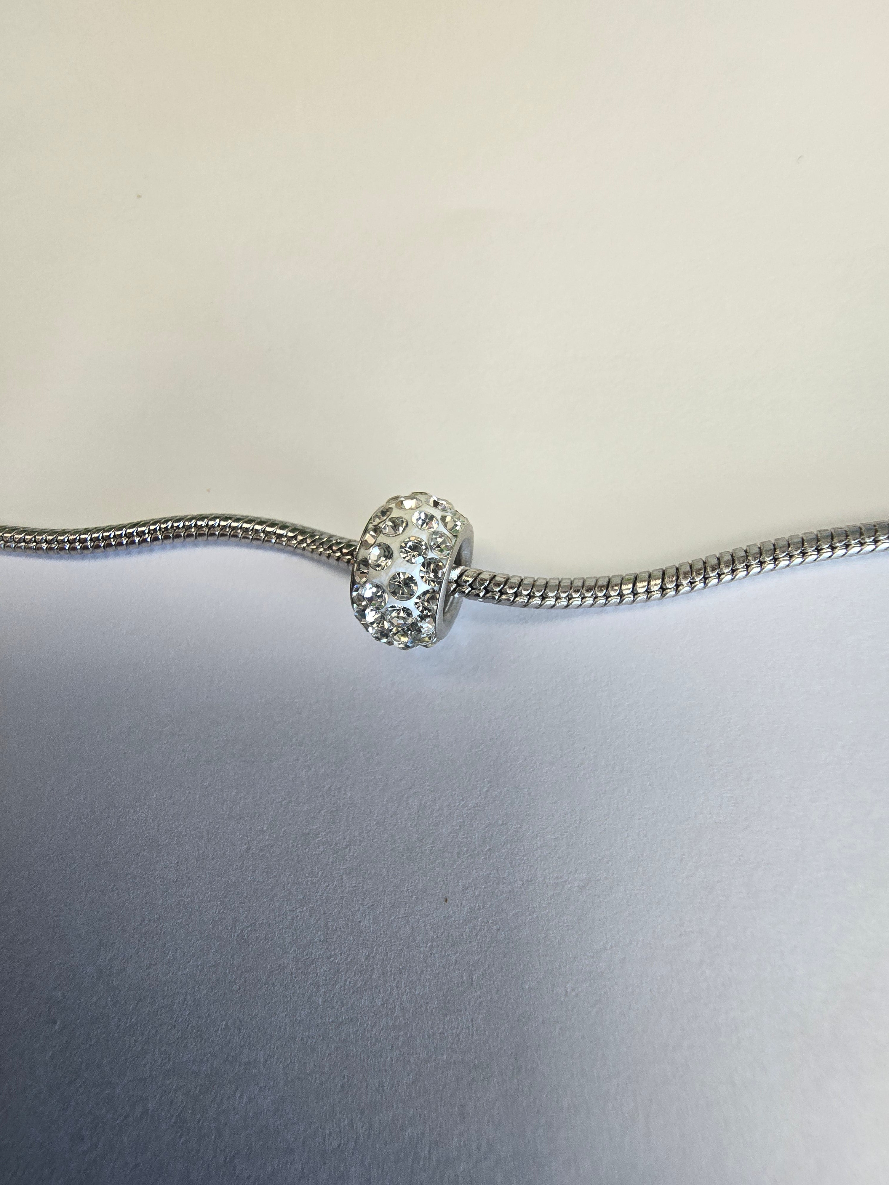 Silver charm fits all charm bracelets