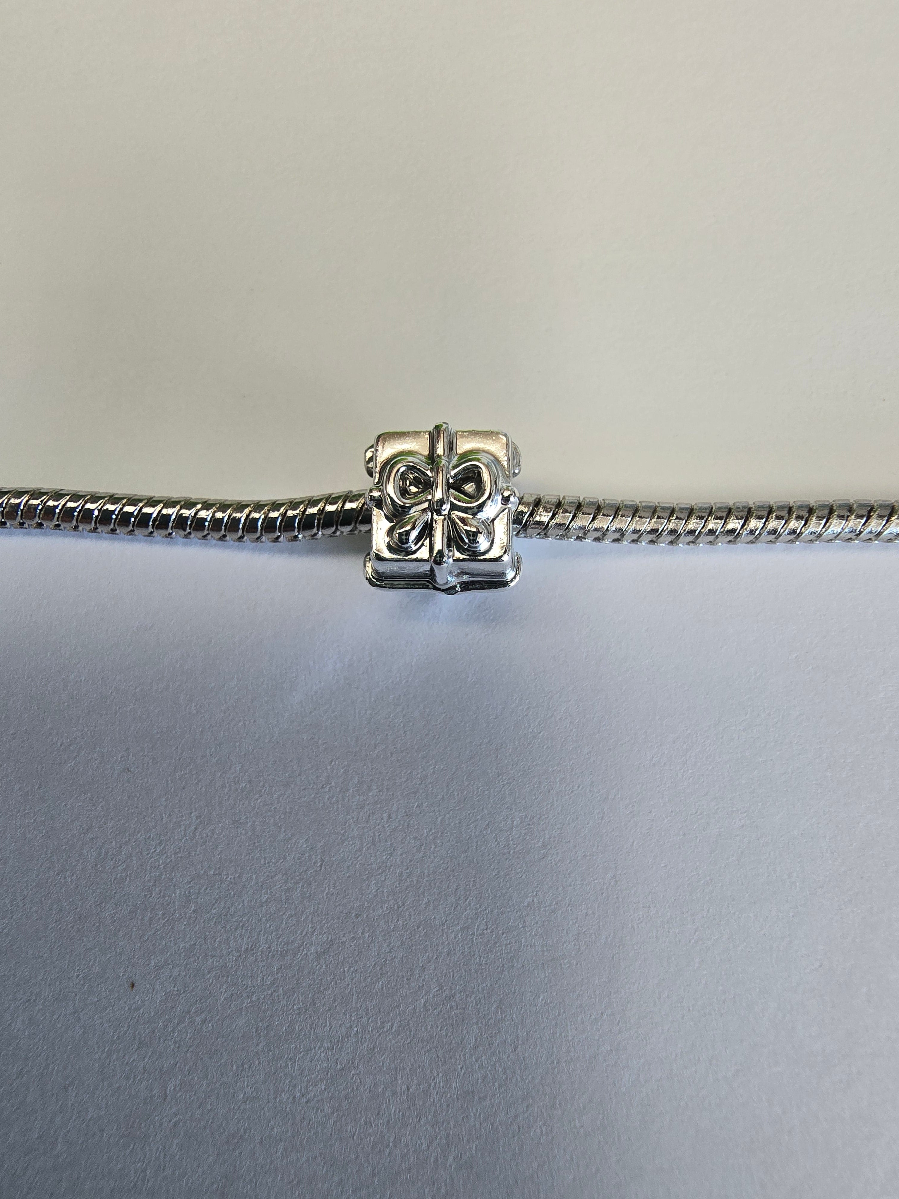 Silver charm fits all charm bracelets