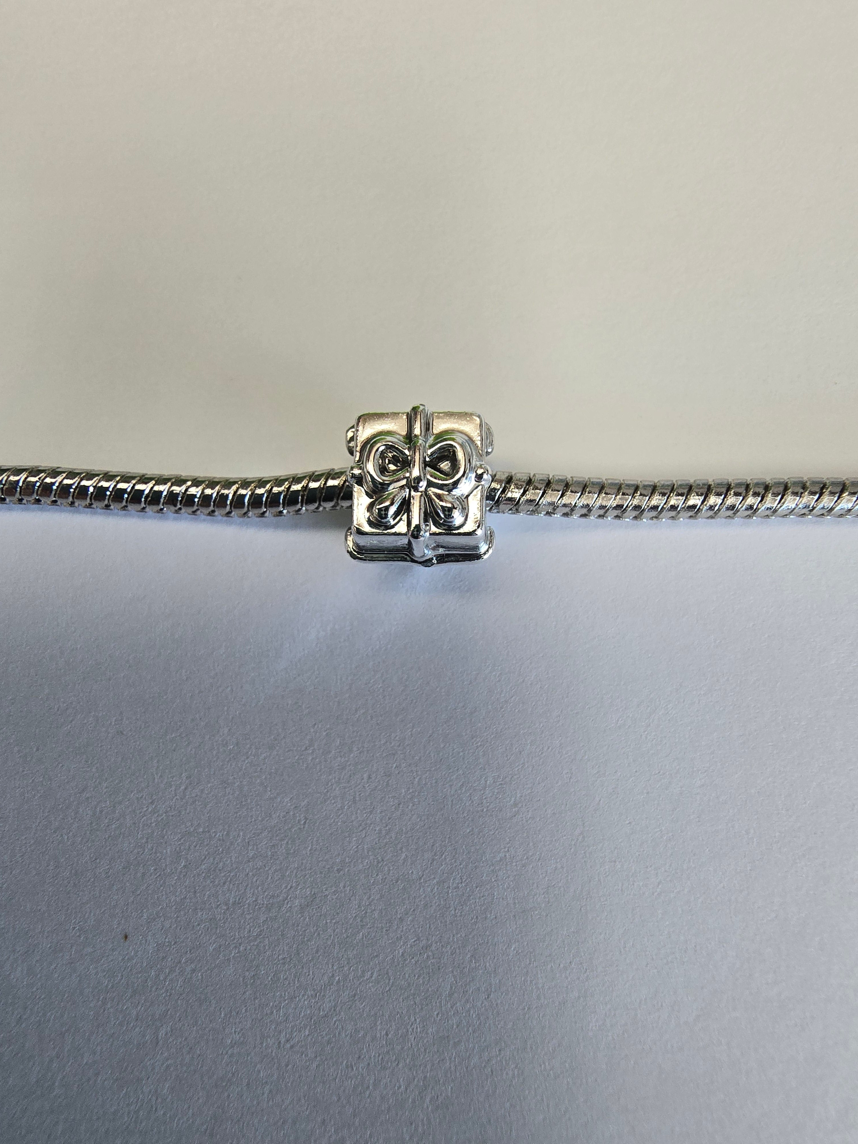 Silver charm fits all charm bracelets