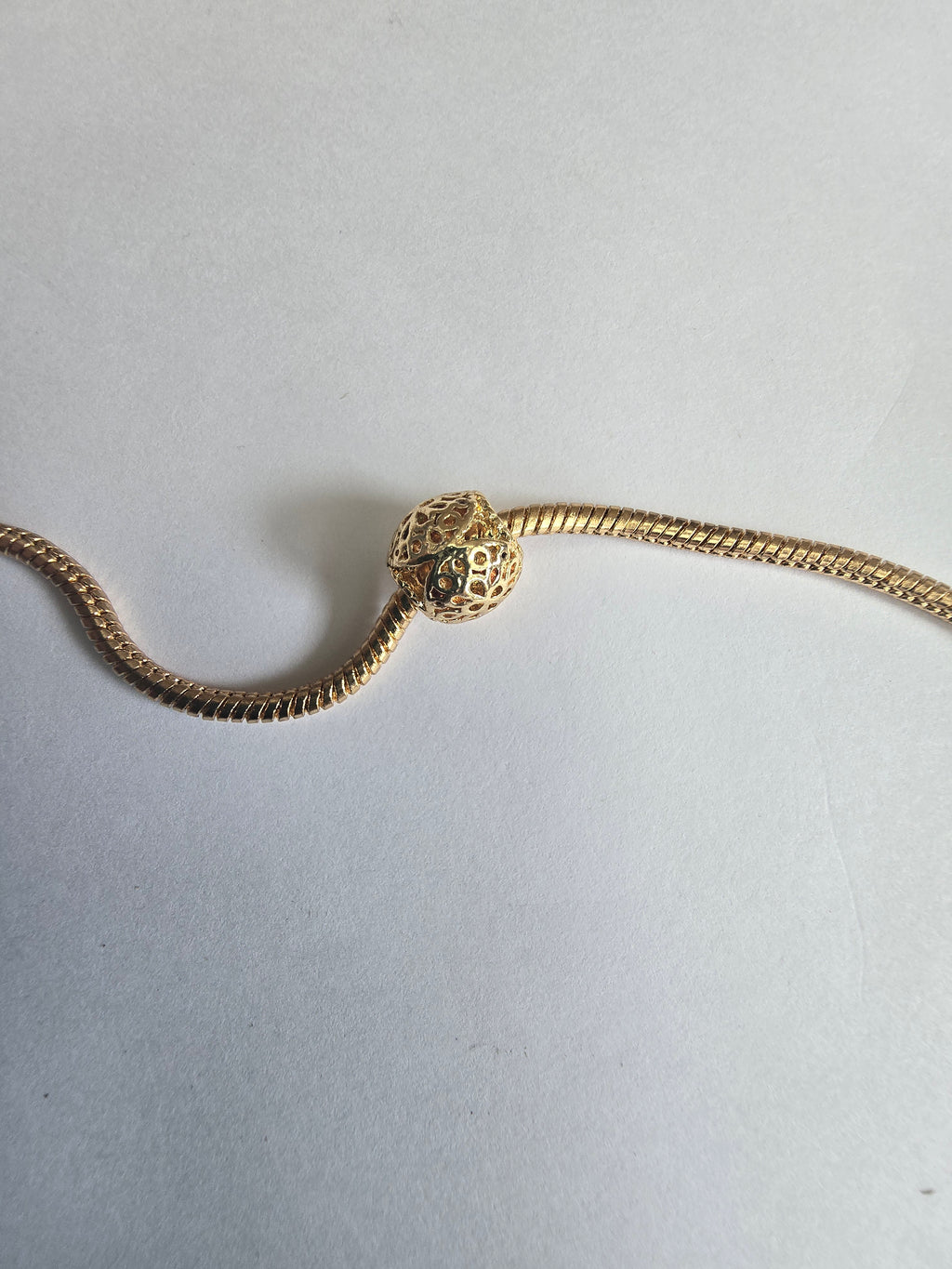 Gold charm fits all charm bracelets