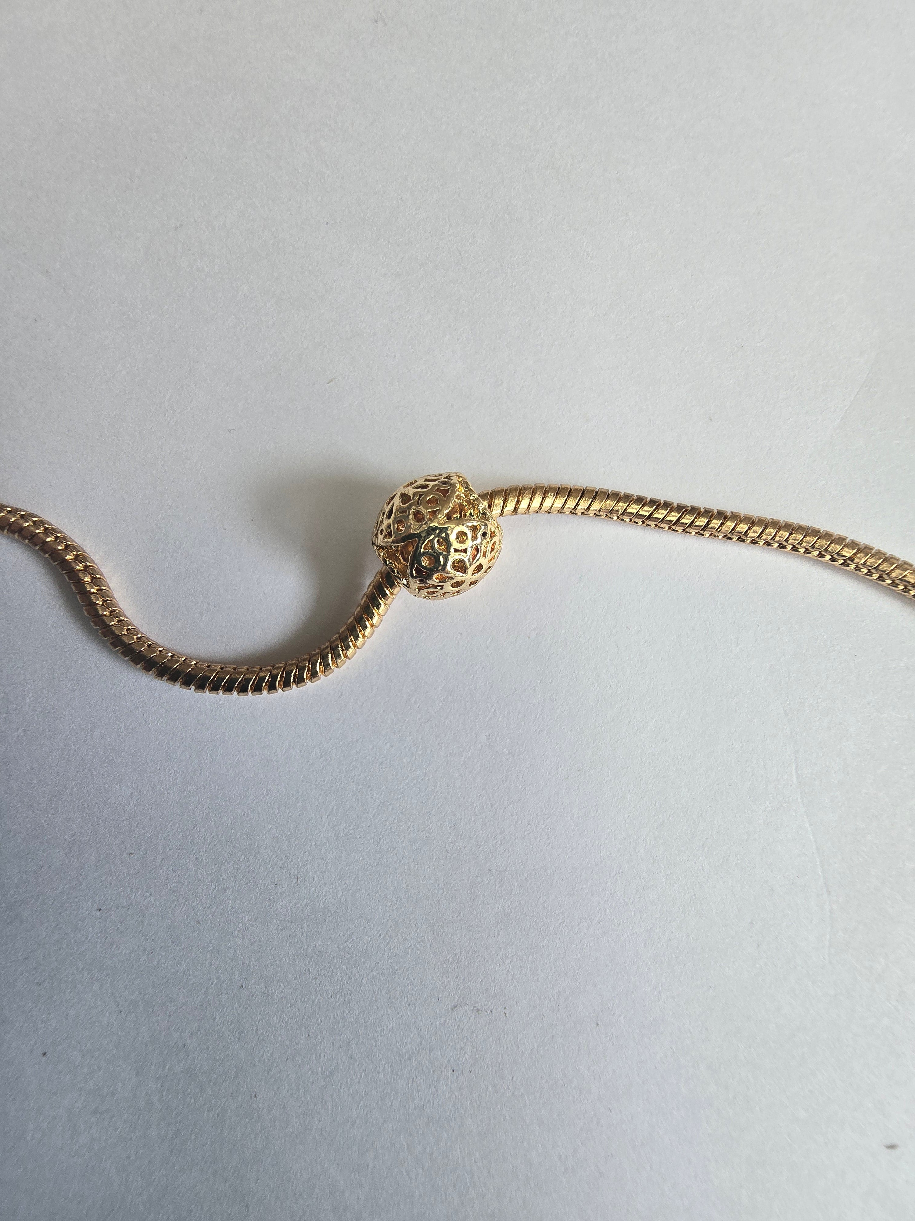Gold charm fits all charm bracelets