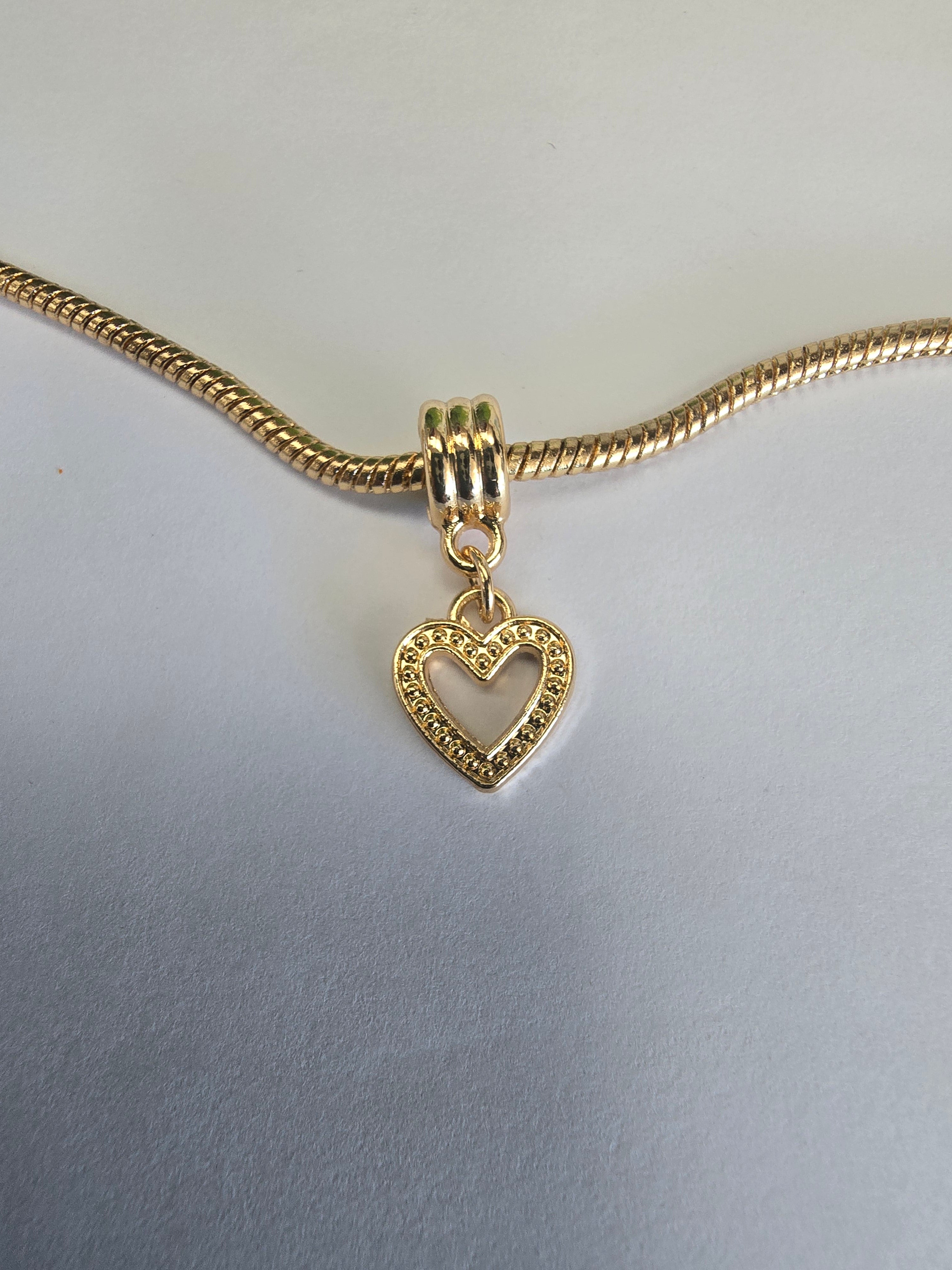 Gold charm fits all charm bracelets