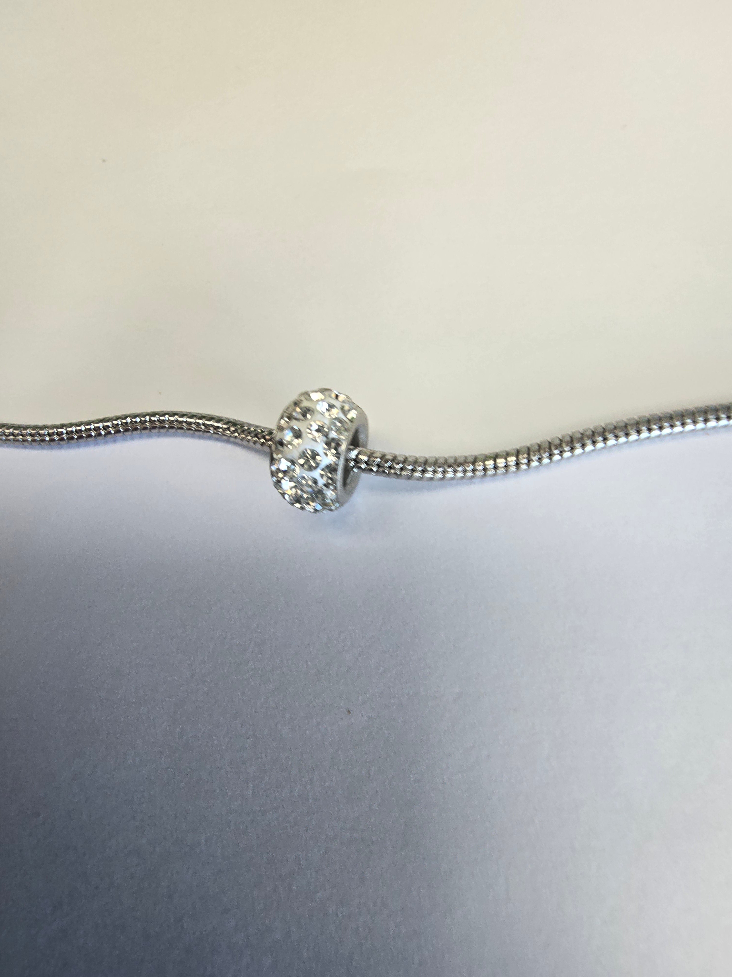 Silver charm fits all charm bracelets