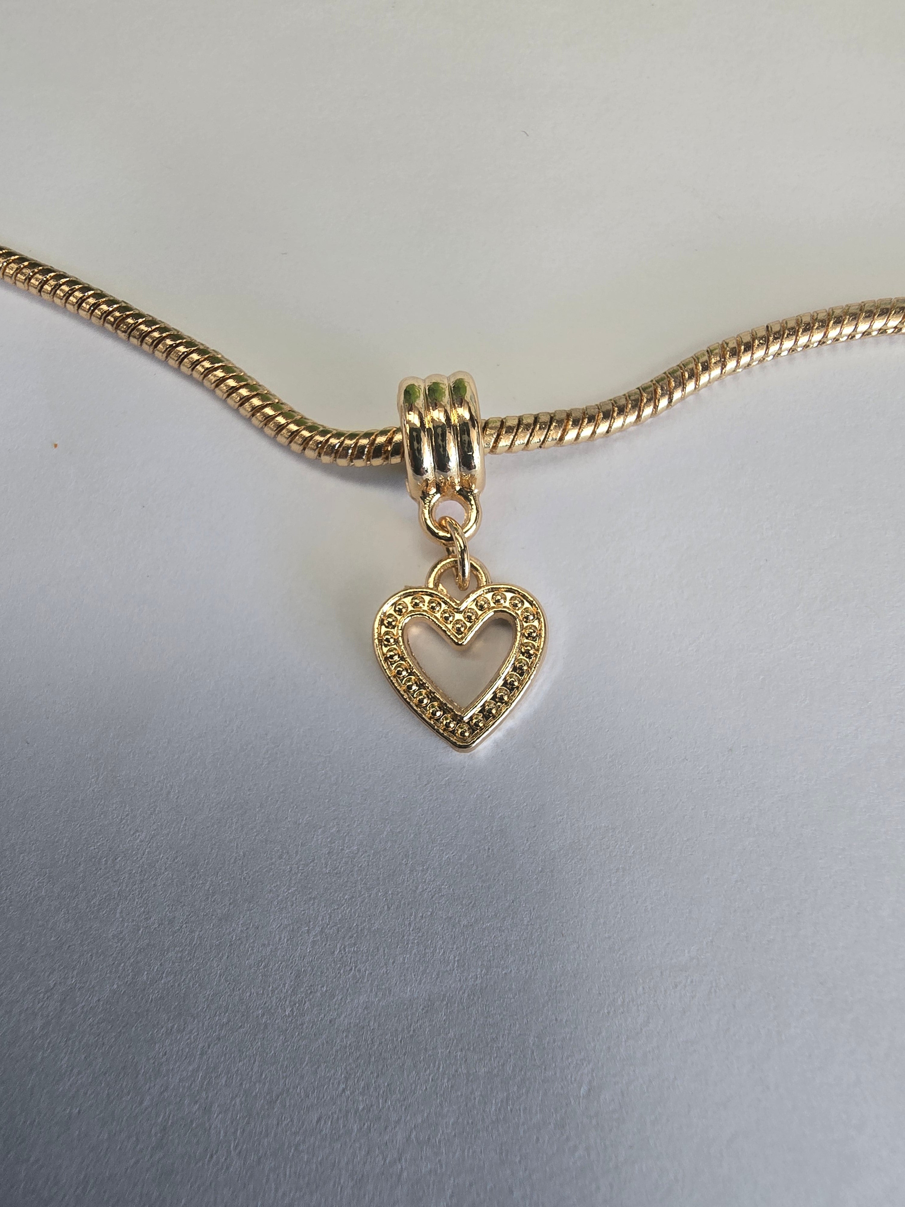 Gold charm fits all charm bracelets
